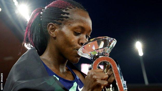 Faith Kipyegon with the Diamond League trophy