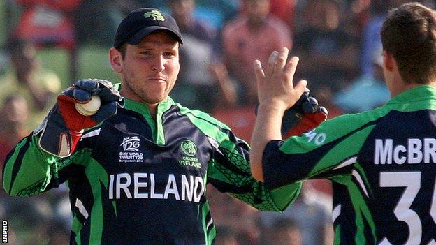 Gary Wilson celebrates one of his 193 dismissals as Ireland wicketkeeper