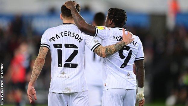 Michael Obafemi scored his first home goal for Swansea from Jamie Paterson's fine cross