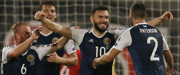 Scotland's Robert Snodgrass (third left) celebrates scoring against Malta