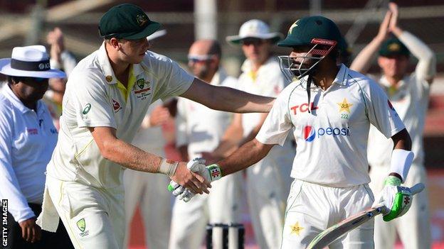 Babar Azam and Cameron Green shake hands