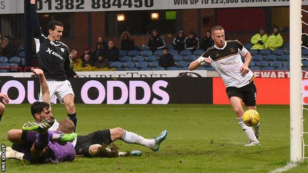 Adam Rooney knocks the ball in from close range