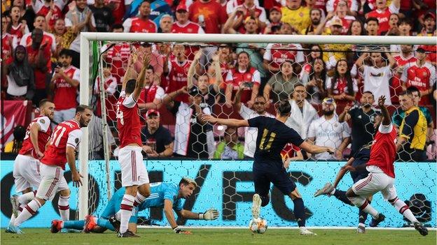 Gareth Bale scores for Real Madrid in the International Champions Cup against Arsenal