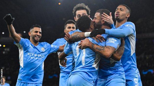 Manchester City players celebrate goal