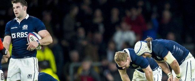 Scotland are disappointed after defeat by England at Twickenham