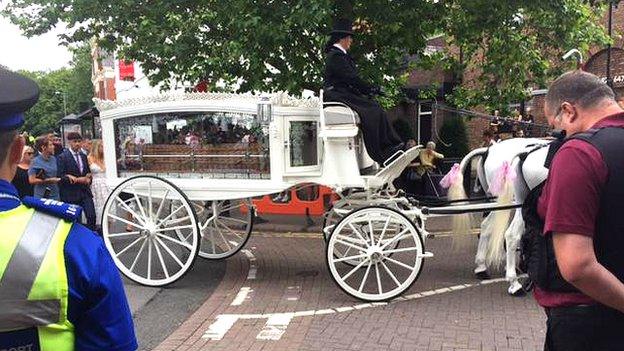 Sue Davey's coffin in carriage