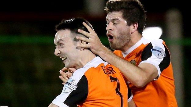 Delight for Mark Edgar after he scores the only goal in the Oval game against Glentoran