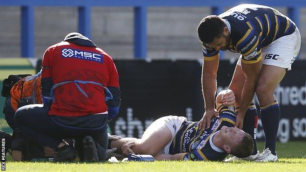 Leeds' Harry Newman receives treatment