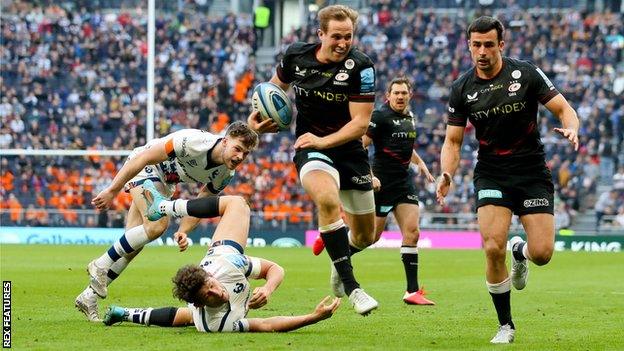 England winger Max Malins scored a try in each half for Saracens at the Tottenham Hotspur Stadium