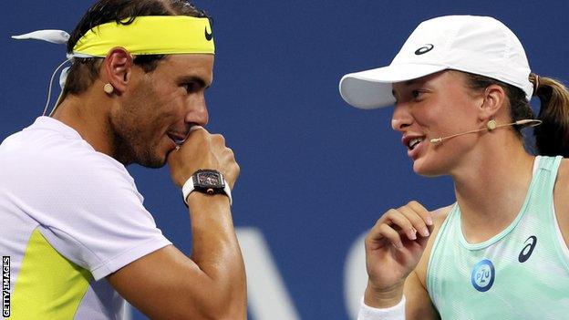 Iga Swiatek chats to Rafael Nadal during the 'Tennis Plays for Peace' exhibition event at the US Open