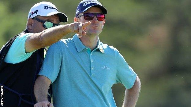 Justin Rose with caddie Mark Fulcher