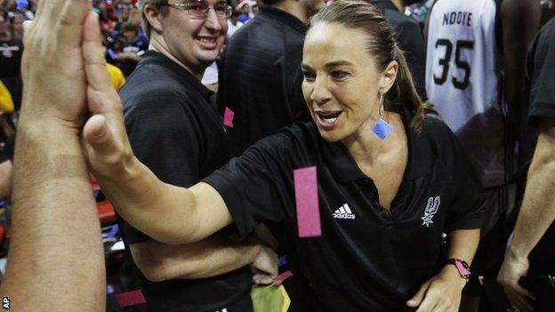 Becky Hammon celebrates leading San Antonio Spurs to the Las Vegas Summer League title