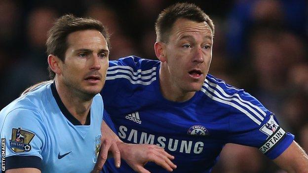 Frank Lampard (left) in action for Manchester City against Chelsea's John Terry