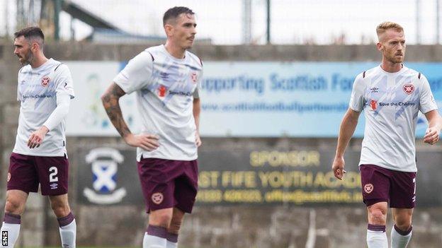 Hearts' Michael Smith, Jamie Walker and Oliver Bozanic are left disappointed