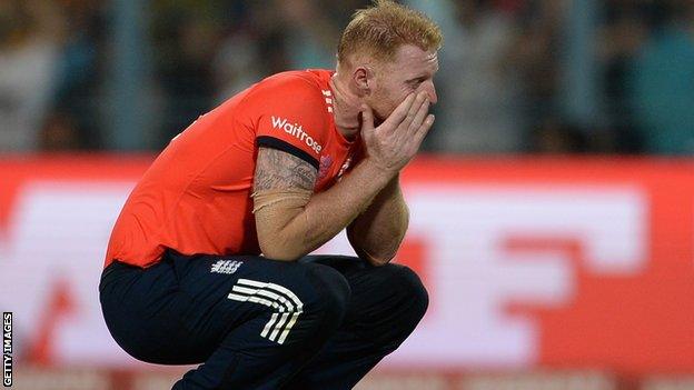 Ben Stokes reacts to being hit for six