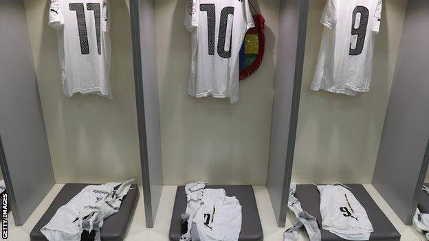 Ghana shirts in a changing room