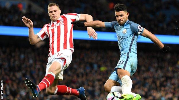 Ryan Shawcross and Sergio Aguero