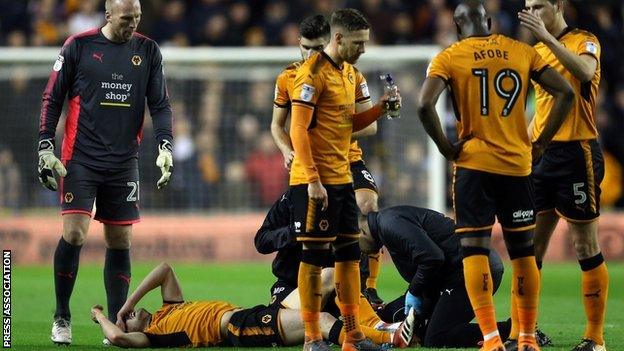 Diogo Jota receives treatment during Wolves' win over Reading