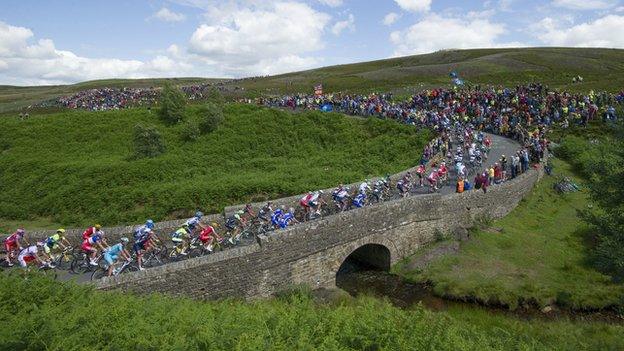 Spectators watch the Tour de France in the Yorkshire Dales in 2014