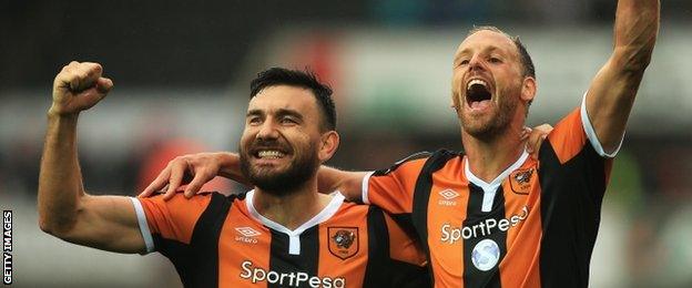 Robert Snodgrass and David Meyler celebrate Hull's 2-0 win at Swansea