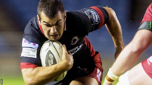 Stuart McInally carries the ball forward for Edinburgh against Scarlets