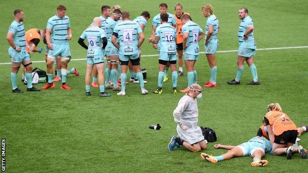 England winger Jonny May had treatment for several minutes at Sixways before being led off for a head injury assessment, from which he did not return