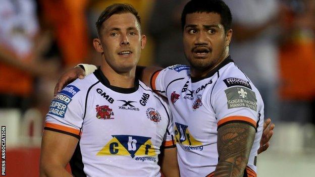 Greg Eden was congratulated after the first of his three tries against Catalans by Cas team-mate Peter Matautia