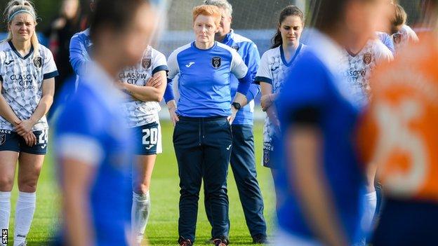 Glasgow City look on as Rangers lift the Scottish Women's Premier League trophy