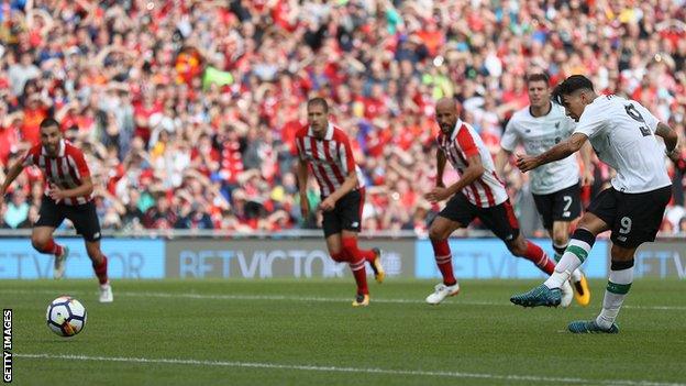 Roberto Firmino scores from the penalty spot