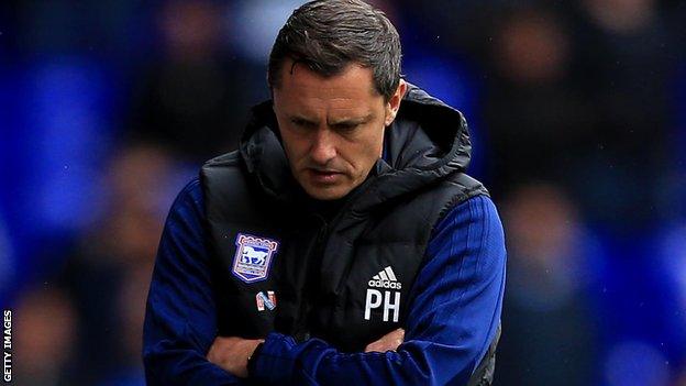 Ipswich boss Paul Hurst watches on