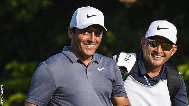 Francesco Molinari and caddie