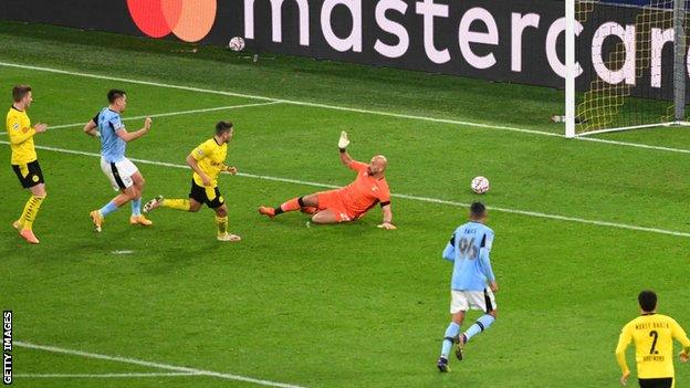 Borussia Dortmund's Raphael Guerreiro opens the scoring