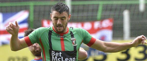 John McGuigan is back for a second stint in Glentoran colours after a spell at Warrenpoint Town