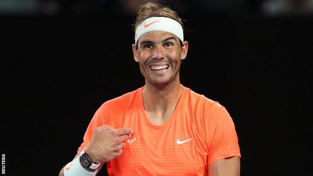 Rafael Nadal laughs during an exchange with a fan during his Australian Open second-round match