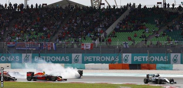 Nico Rosberg span at the first corner in Malaysia after being hit by Ferrari's Sebastian Vettel but recovered to finish third