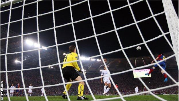 Lionel Messi scores with his head past Edwin van de Sar as Rio Ferdinand watches on - 2009 Champions League Final.