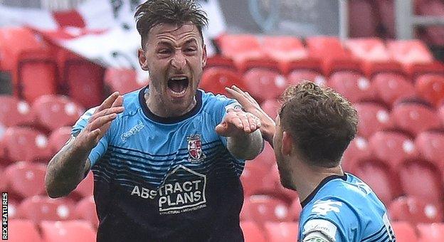 Jake Hyde celebrates his goal over Swindon