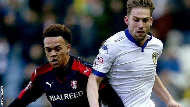 Shay Facey (left) jostles with a Leeds United player during an FA Cup tie for Rotherham in January 2016