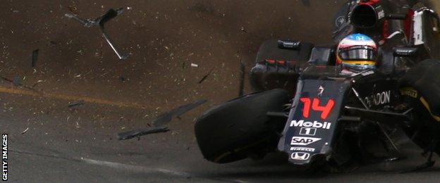 Fernando Alonso hits the wall