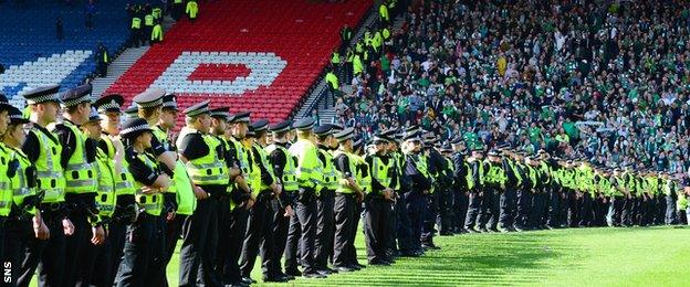 Police formed a cordon on the pitch