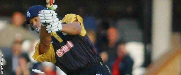 Andrew Symonds plays a cover drive