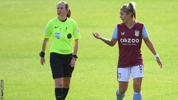 Referee Cheryl Foster and England international Rachel Daly