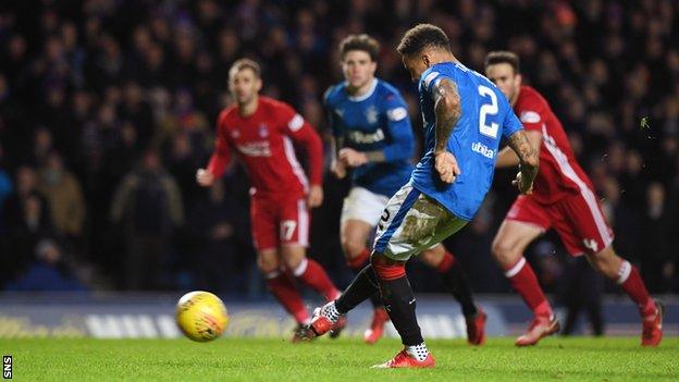 Rangers defender James Tavernier scores a penalty against Aberdeen