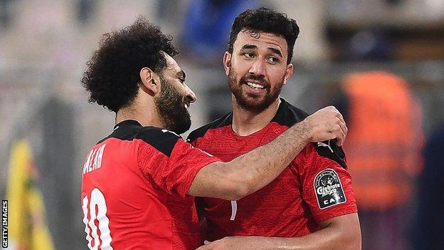 Trezeguet (right) celebrates his goal against Morocco at the Africa Cup of Nations with Mohamed Salah