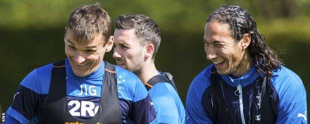 Lee McCulloch and Bilel Mohsni share a joke during Rangers training