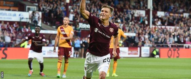 Gavin Reilly celebrates scoring for Hearts