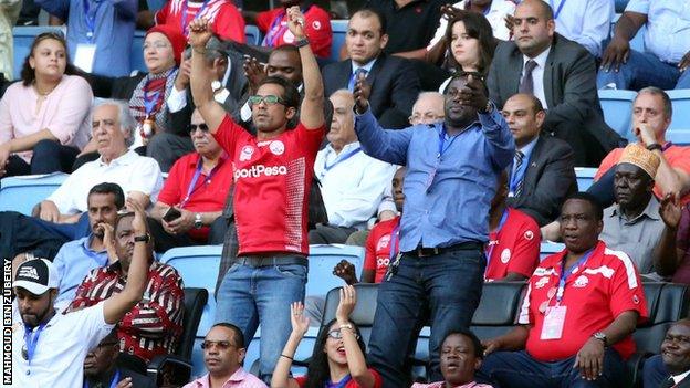 Simba's part owner Mohammed Dewji celebrates with fans at a game