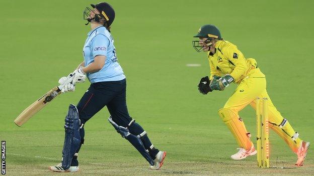 England's Anya Shrubsole looks up in despair after being bowled during the first ODI against Australia