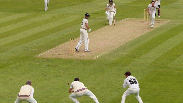 After taking two wickets the night before, Craig Overton held a catch off brother Jamie before claiming two more scalps himself to reach 20 wickets for the season