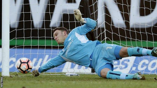 Simon Eastwood saves Aleksandar Mitrovic's penalty